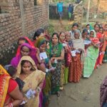 Voters queue outside a rural polling booth in Bihar during Phase-1 polling on 6 Nov 2025.