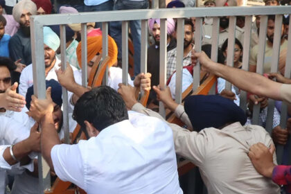Students protesting outside Punjab University campus with banners and slogans during fee hike agitation, Chandigarh, Punjab University Protests November 2025