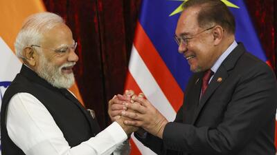 india,-malaysia-ink-11-pacts;-upi-paynet-link-to-ease-remittances