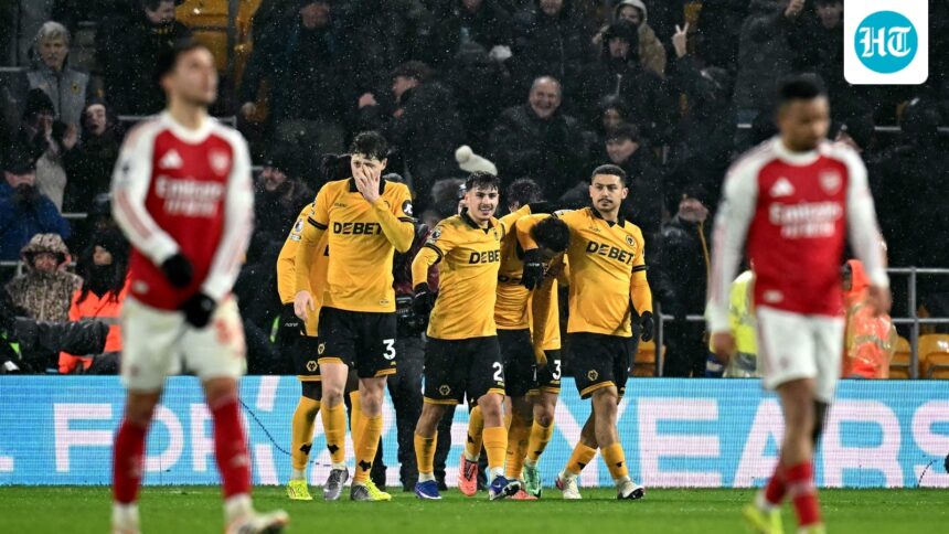 arsenal-loses-a-2-0-lead-to-last-placed-wolverhampton,-and-draws-2-2-as-manchester-city-gets-a-big-boost-in-the-race-for-the-english-premier-league-title.