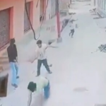 a-man-was-ambushed-and-shot-dead-by-three-assailants-outside-a-greater-noida-home,-and-the-incident-was-captured-on-cctv.