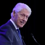 bill-clinton-smiling-and-laughing-in-photo-during-epstein’s-testimony