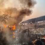 14-people-were-killed-and-27-others-injured-when-a-bus-collided-with-a-dumper-truck-in-andhra-state,-causing-a-fire.