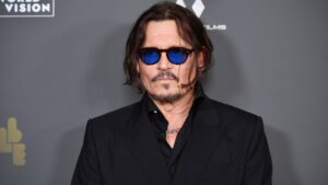 johnny-depp-designed-a-bottle-for-a-rum-brand-inspired-by-his-tattoos-and-the-love-of-his-life