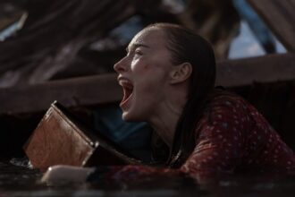 ‘thrash’-movie-review:-phoebe-dynevor-gives-birth-in-shark-infested-floodwaters-in-preposterous-but-fun-movie-on-netflix