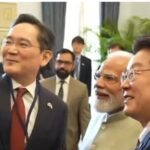 galaxy-z-flip7-‘made-in-india’-selfie:-pm-modi-poses-for-a-photo-with-samsung-chief-and-south-korean-president-|-he-watches