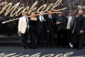 “michael’s”-team-talks-about-jackson’s-family’s-involvement-in-the-biopic-and-its-choice-to-tell-a-“dazzling-story-of-his-triumph”-amid-“complex-opinions”-about-the-star