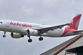 a-passenger-jumps-from-an-air-arabia-plane-after-landing-at-chennai-airport-while-riding-in-a-taxi
