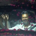 watch:-vijay’s-supporters-surround-his-car,-shower-petals-as-tvk-makes-historic-debut-for-tamil-nadu