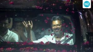 watch:-vijay’s-supporters-surround-his-car,-shower-petals-as-tvk-makes-historic-debut-for-tamil-nadu