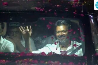 watch:-vijay’s-supporters-surround-his-car,-shower-petals-as-tvk-makes-historic-debut-for-tamil-nadu