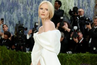 alex-consani-celebrates-becoming-the-first-trans-woman-on-the-met-gala-hosting-committee-by-baring-breasts-on-the-red-carpet-in-a-sheer-gucci-gown