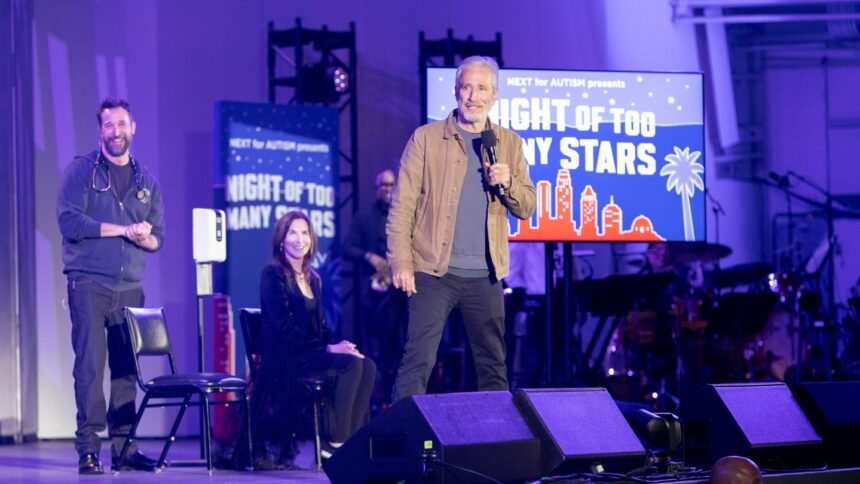 noah-wyle-performs-a-physical-examination-on-the-hollywood-bowl-stage-as-part-of-netflix’s-prank-feature-show