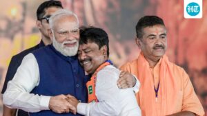 ashok-kirtania-takes-oath-as-bengal-minister,-receiving-a-warm-hug-from-pm-modi
