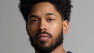 cannes:-kelvin-harrison-jr.-presents-the-golden-globe-award-for-documentary-feature-for-powerful-storytelling