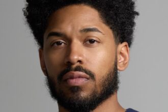 cannes:-kelvin-harrison-jr.-presents-the-golden-globe-award-for-documentary-feature-for-powerful-storytelling
