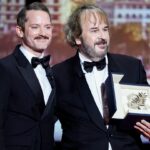 peter-jackson-receives-the-palme-d’or-at-cannes-from-elijah-wood-in-a-colorful-opening-ceremony