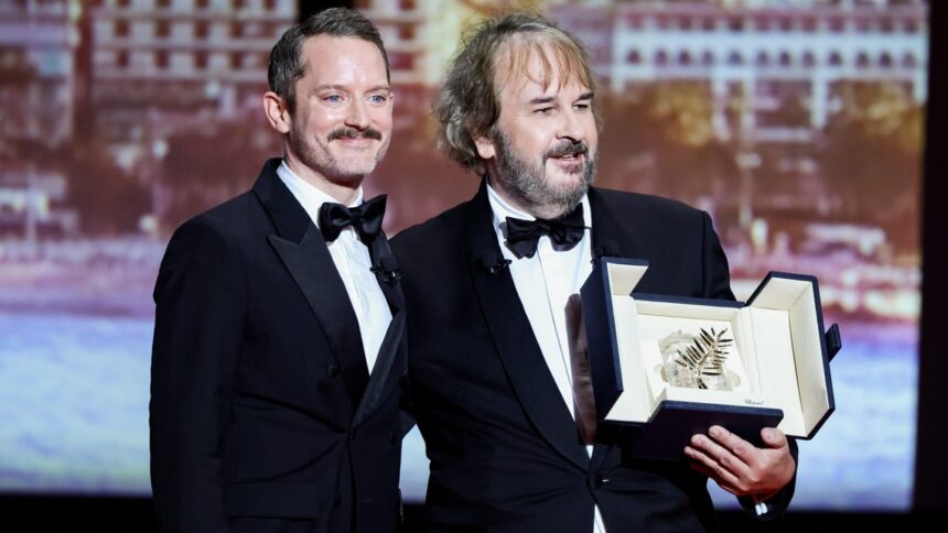 peter-jackson-receives-the-palme-d’or-at-cannes-from-elijah-wood-in-a-colorful-opening-ceremony