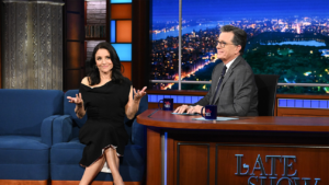 stephen-colbert-kisses-pedro-pascal-and-julia-louis-dreyfus-on-the-late-show-a-day-after-hugging-jimmy-fallon