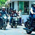 maharashtra-cm-fadnavis-rides-bike-to-vidhan-bhavan-after-pm-modi’s-appeal-to-conserve-fuel-|-he-watches