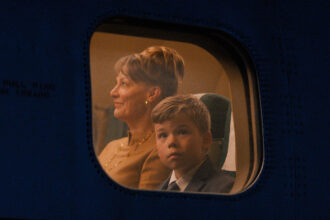 propeller-one-way-night-coach-movie-review:-john-travolta’s-directorial-debut-is-a-strange-but-endearing-take-on-mid-century-modern-nostalgia