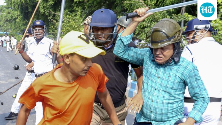 policemen-injured-after-being-stoned-during-a-bulldozer-protest-on-park-street-in-kolkata;-several-were-arrested
