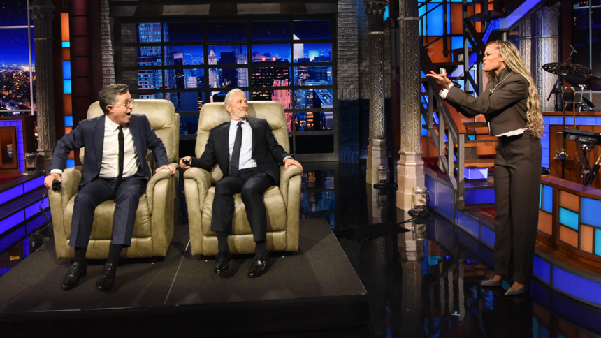 jon-stewart-surprises-stephen-colbert-with-a-comfortable-chair-and-a-guest-in-his-final-appearance-on-the-“late-show”