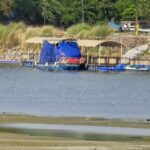 the-delhi-ferry-project-has-been-delayed-as-the-5-km-long-road-in-the-yamuna-has-become-largely-dry