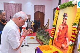 tvk-and-dmk-criticize-guv-as-he-praises-photo-of-thiruvalluvar-in-saffron-outfit