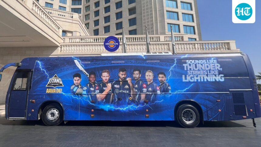 gujarat-titans-players-and-staff-were-evacuated-from-the-team-bus-after-an-electrical-short-caused-it-to-malfunction