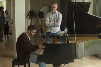 john-carney-praises-nick-jonas-for-not-strong-arming-himself-for-the-‘power-ballad’-soundtrack.