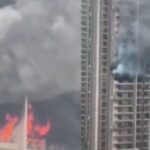 noida-high-rise-building-evacuated-after-fire-in-12th-floor-apartment,-video-captures-horror