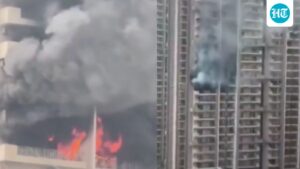 noida-high-rise-building-evacuated-after-fire-in-12th-floor-apartment,-video-captures-horror