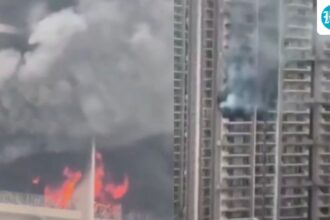 noida-high-rise-building-evacuated-after-fire-in-12th-floor-apartment,-video-captures-horror
