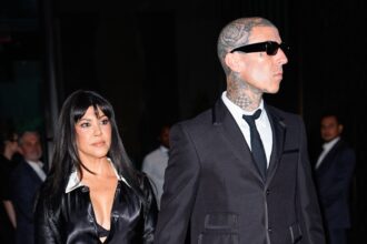 kourtney-kardashian-and-travis-barker-won’t-stop-touching-each-other-on-the-red-carpet-—-and-that’s-actually-the-point