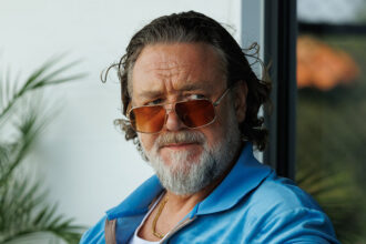 the-get-out-movie-review:-russell-crowe-is-ridiculous-as-an-albanian-nightclub-owner-in-a-neo-noir-pastiche-comedy