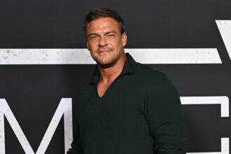 alan-ritchson-on-what-he-learned-about-fame-from-working-with-arnold-schwarzenegger