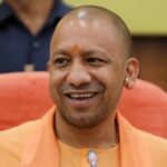 yogi-adityanath-showers-petals-on-kanwariyas-in-meerut-|-watch
