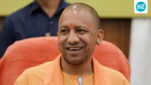 yogi-adityanath-showers-petals-on-kanwariyas-in-meerut-|-watch