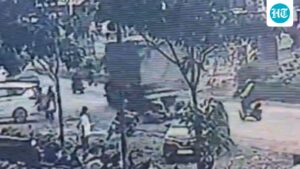 pune-boy,-11,-dies-under-truck-wheels-after-bike-skids-on-broken-road;-cctv-captures-crash
