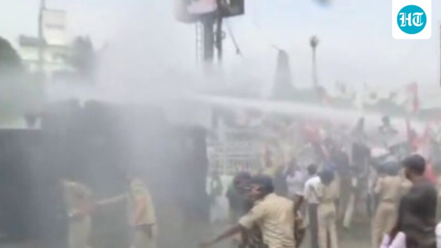 bihar-cops-use-water-cannons-on-march-led-by-tejashwi-yadav-over-paper-leak,-unemployment