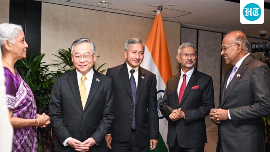 india,-singapore-sign-pacts-on-telecom,-food-security;-discuss-smrs,-chips