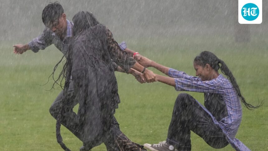 waterlogged-roads-or-a-stream?-kids-swim-on-streets,-traffic-snarls-as-heavy-rain-pounds-delhi-ncr