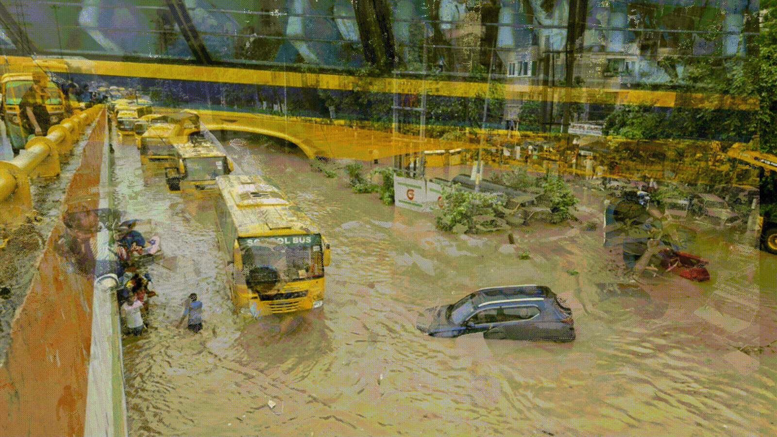 gurugram-rain-chaos:-school-buses-stranded-for-hours-with-kids,-ambulances-stuck;-wfh,-online-classes-advised