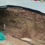 gurugram-sewer-line-breach-causes-road-cave-in-at-iffco-chowk;-traffic-diverted