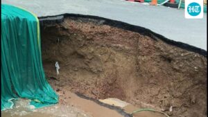 gurugram-sewer-line-breach-causes-road-cave-in-at-iffco-chowk;-traffic-diverted