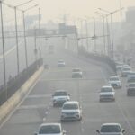 vehicles-move-through-smog-as-aqi-begins-to-shoot-up-in-delhi,-ghaziabad