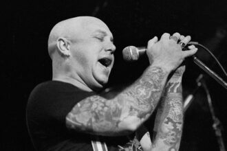how-did-angry-anderson-die?-what-we-know-about-the-rose-tattoo-frontman’s-cause-of-death