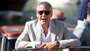 george-clooney-gushes-over-“badass”-wife-amal-and-takes-swipe-at-trump-during-jovial-venice-masterclass