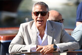 george-clooney-gushes-over-“badass”-wife-amal-and-takes-swipe-at-trump-during-jovial-venice-masterclass